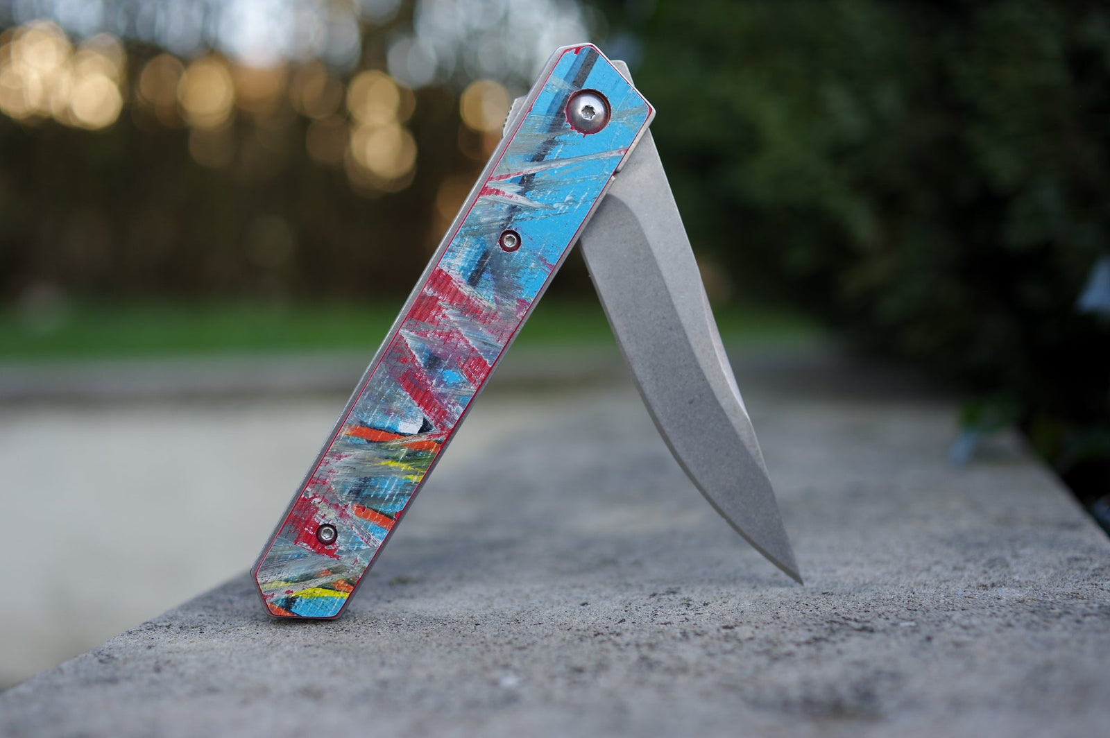 Couteau 7PLIS skateboard recyclé bleu et rouge - 7PLIS